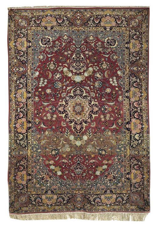 ISFAHAN old. Old rose ground with dark central medallion and green corner motifs, finely patterned with trailing flowers and palmettes. Dark border. Good condition. 140x204 cm.