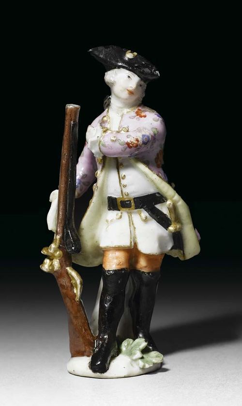 MINIATURE FIGURE OF A HUNTER, Meissen, circa 1755. Model probably by J.J. Kändler or P. Reinicke, traces of crossed swords in underglaze-blue, H 7.8 cm, heavily restored and damaged. Provenance: Private collection, West Switzerland.