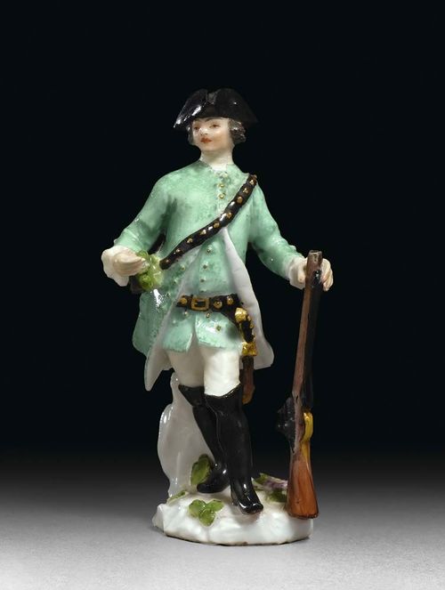 MINIATURE FIGURE OF A HUNTER, Meissen, circa 1755. Model probably by J.J. Kändler or P. Reinicke, crossed swords in underglaze-blue to the rear, H 7.5 cm, restoration to the neck and small areas. Provenance: Private collection, West Switzerland.