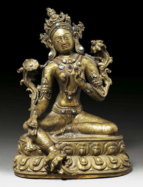 BRONZE FIGURE OF GREEN TARA The necklace and edges of garments with inlaid copper, the jewellery with turquoises, coral and individual glass stones. The eyes and mouth cold painted. The garments with fine engraving. Tibet, 17th century.  H 18 cm. From a Swiss private collection