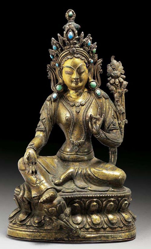 BRASS BRONZE FIGURE OF GREEN TARA. The face, hair and back of the crown with remains of ritual paint. Sino-Tibetan, 18/19th century. H 18.5 cm. From a Swiss private collection