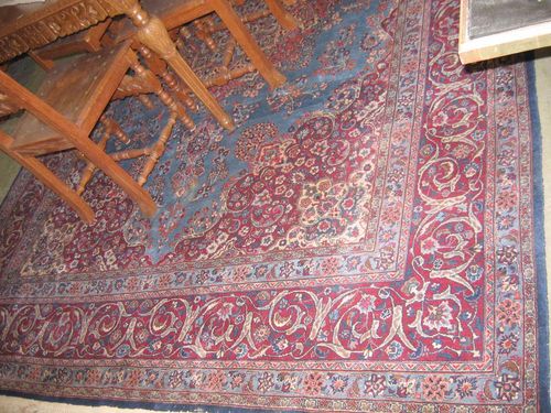 KESHAN old.Light blue ground with red corner motifs and floral central medallion, red border. Good condition, 348x361 cm.