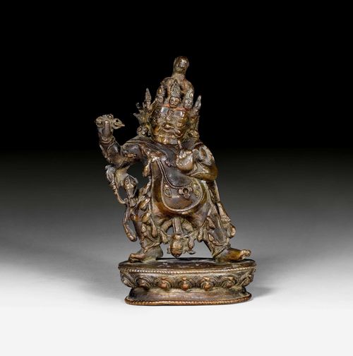 A DARK PATINATED COPPER FIGURE OF HAYAGRIVA. Tibet, ca. 17th century. Height 12 cm.