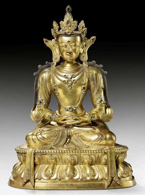 A GILT BRONZE FIGURE OF AMITHABA WITH FINE DETAILS. Tibeto-chinese, 17th c. Height 23.8 cm.