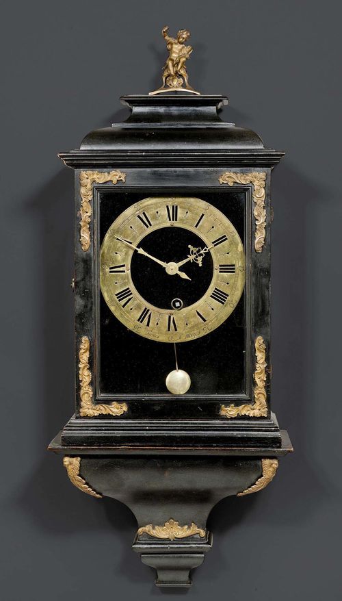 PAINTED MANTEL CLOCK with plinth,Regence, the dial and movement signed DUMIER A MORGES (active in the 18th century), circa 1720/40. Wood painted black. Rectangular case glazed on 3 sides. Brass chapter ring. Fine brass movement striking the 1/2 hours on bell. Bronze mounts and applications. 34x17x82 cm.