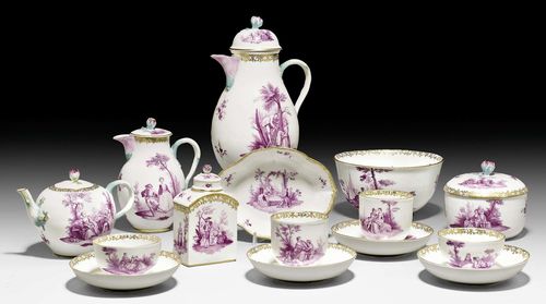 COFFEE AND TEA SERVICE WITH WATTEAU SCENES IN PURPLE CAMAIEU, MEISSEN, CIRCA 1763. Comprising: 1 coffee pot and lid, 1 milk jug and lid, 1 teapot and lid, 1 soucoupe, 1 tea caddy and lid, 1 bowl, 12 tea cups and saucers, 4 coffee cups and saucers. Underglaze blue sword marks with dot. Minor chips.