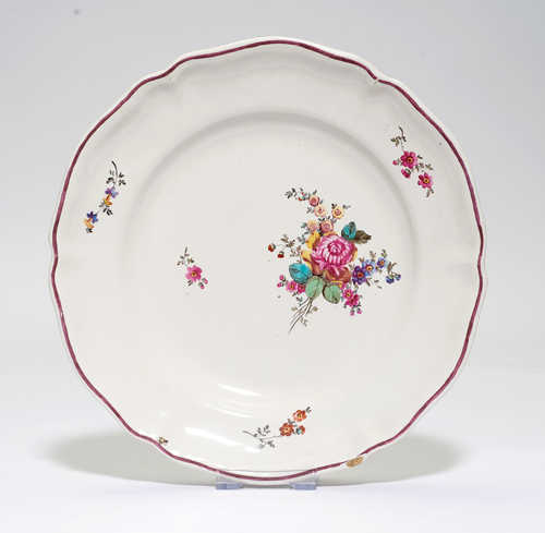 FAIENCE PLATE DECORATED WITH FLOWERS,