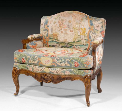 MARQUISE CHAIR WITH TAPESTRY COVER,Louis XV style, Paris. Shaped and carved walnut. Fine tapestry cover. 87x50x33x91 cm. Provenance: from a highly important Swiss private collection.
