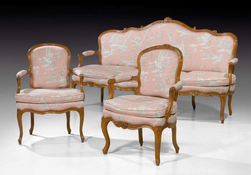 SMALL SUITE OF FURNITURE,Louis XV, in the style of L. DELANOIS (Louis Delanois, maitre 1761), Paris circa 1760. Comprising: 1 three-seater canape and 1 pair of similar fauteuils "en cabriolet." Shaped and profiled beech. Pink silk cover. Seat cushion. Canape 200x65x46x125 cm, Fauteuils approx. 62x53x46x87 cm. Provenance: from a highly important Swiss private collection.