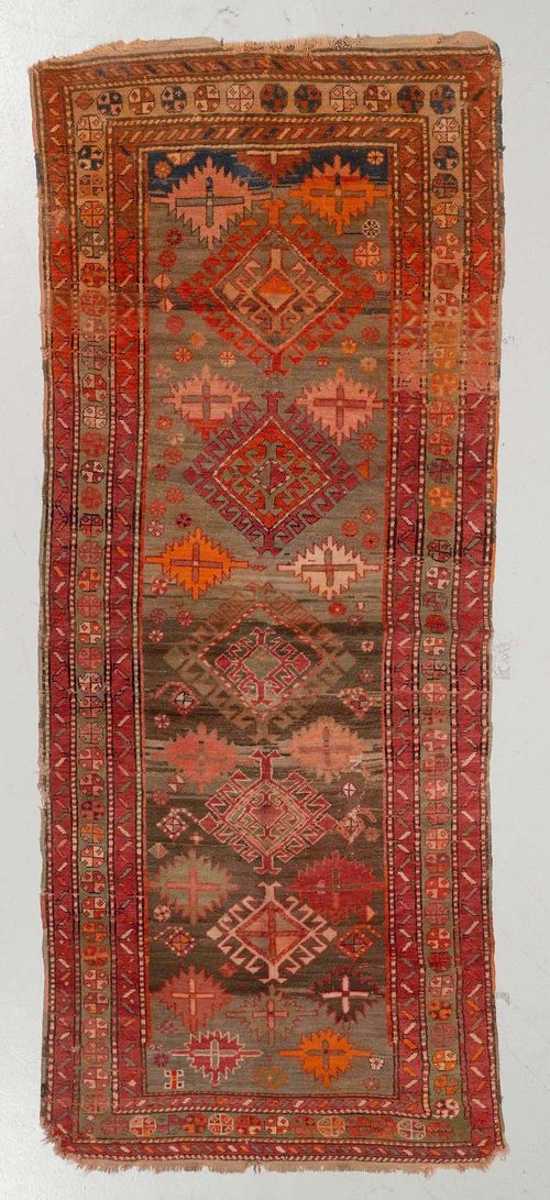 KARS KAZAK old.Blue central field patterned with star motifs, triple-stepped border, signs of wear, 114x260 cm.