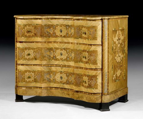 COMMODE,Baroque, probably Mainz circa 1740/60. Walnut, birch, various partly dyed various fruitwoods and pewter with exceptionally fine inlays. With replaced, ebonized feet. The front with 3 drawers. Bronze mounts. 109x56x91 cm.