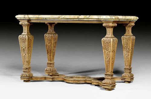 CENTER TABLE,Louis XIV, probably German, 18th/19th century. Oak exceptionally richly carved with flowers, leaves and frieze. "Giallo di Siena" top. 128x72x81 cm.