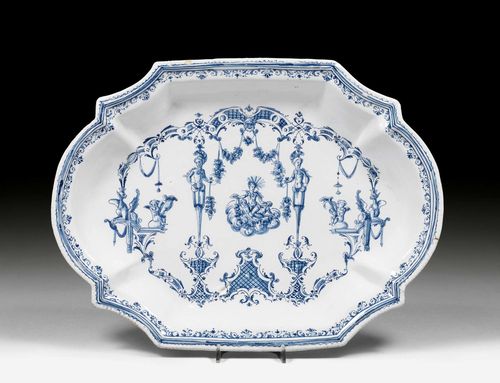 OVAL BASIN 'DECOR A LA BERAIN',Moustier, circa 1720-30. L 38 cm.