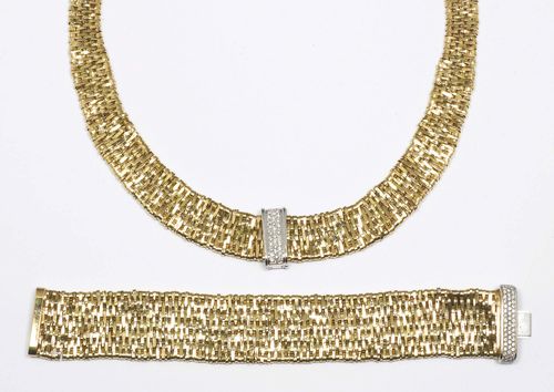 GOLD AND DIAMOND SET, ORLANDO ORLANDINI. Yellow and white gold 750, 126g and 81g. Dune model. Very decorative  necklace of finely braided gold bands, the front additionally decorated with 1 appliqued barrette in white gold, pavé-set with numerous  brilliant-cut diamonds weighing ca. 0.50 ct. W ca. 2 cm, L ca. 46.5 cm. Matching bracelet with a diamond-set barrette clasp of ca. 0.50 ct. W ca. 3 cm, L ca. 19 cm.