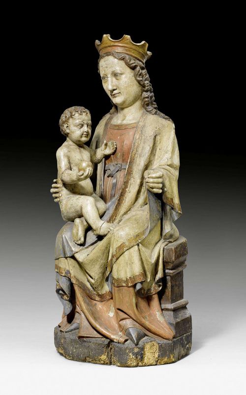 ENTHRONED MADONNA AND CHILD, France, Gothic type, probably ca. 1400. Wood carved and painted. Mary is seated on a bench-like throne in a finely girded robe, facing the viewer. The child is looking to the left. Some losses and worm holes. Figure is highly retouched and repainted. H 90 cm. Provenance: private collection, Switzerland.