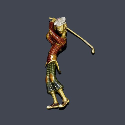 ENAMEL, RUBY AND DIAMOND CLIP BROOCH / FIGURINE. DAMIANI, ca. 1960. Yellow and white gold 750, 43g, malachite base 172g. Very decorative brooch designed as a golf player, the outfit polychrome enamelled on a chequered background, the shoes enamelled in brown and white, the white gold hat set throughout with 24 brilliant-cut diamonds weighing, ca. 0.20 ct, and 1 ruby. Can be mounted on a malachite base with 1 pearl as the ball. Clip brooch, ca. 9 x 5 cm, base, ca. 8 x 5 cm.