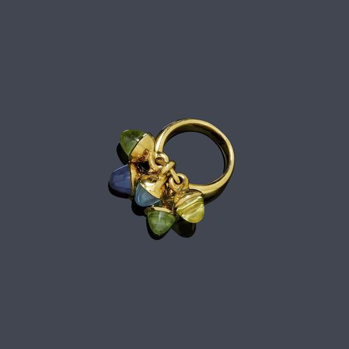 GEMSTONE RING, TAMARA COMOLLI. Yellow gold 750. Mikado model. Decorative ring with 5 pendants, set with gemstones such as topaz, tourmaline and peridot.  Size ca. 55.