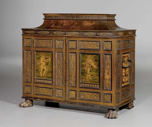 CABINET,early Baroque, Tyrol, 17th century. Molded wood, carved and inlaid with partly colored fruitwoods; soldiers in noble uniform. Rectangular structure with raised cornice with sliding compartment, and lateral carrying handles. The front with double doors below 3 adjacent drawers. Architecturally structured "a facade italienne" fitted interior of doors and drawers. 6 secret drawers. The doors finely inlaid inside. Old iron lock. Wooden knobs. 81x42x72 cm.