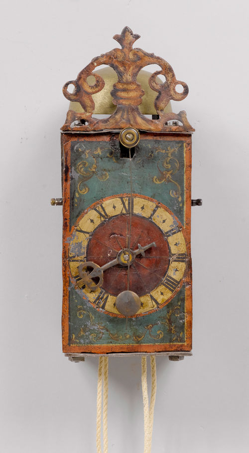 IRON CLOCK WITH FRONT PENDULUM,
