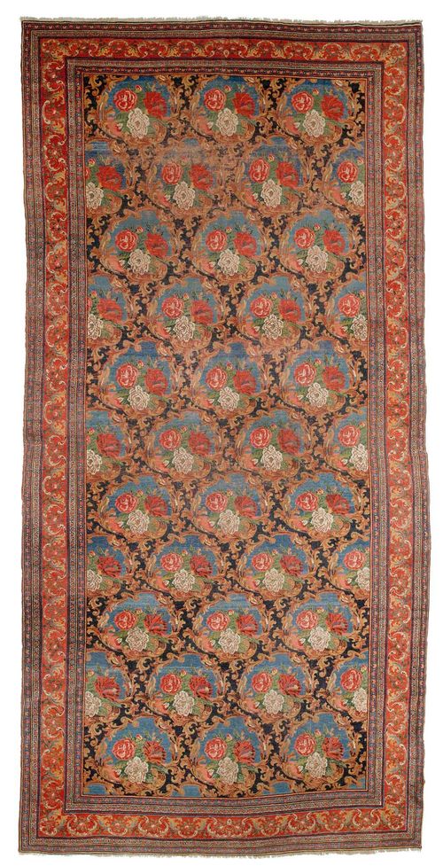 BIDJAR antique.Black central field patterned throughout with rose medallions, red border with trailing flowers, signs of wear, 190x450 cm.