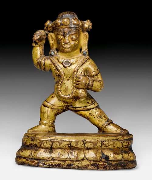 A GILT COPPER ALLOY FIGURE OF VAJRAPANI WITH A VAJRA AND BELL.