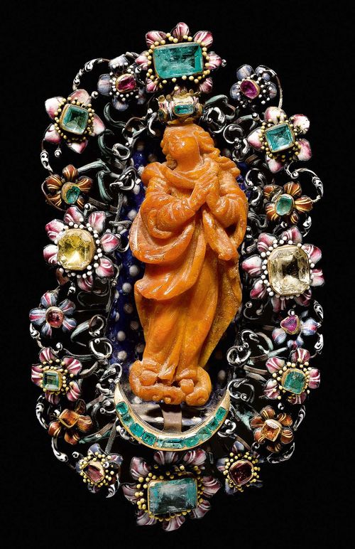 MADONNA AMULET,Early Baroque, Spain, 17th century. Amber, foiled emeralds, rubies and yellow quartz with enameled brass.  H 13 cm. W 17.5 cm.