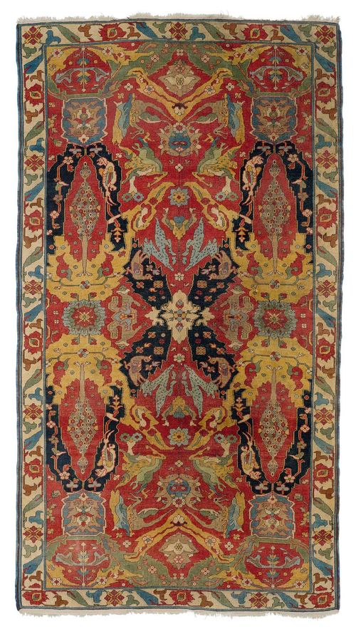 TODUK antique.Red ground, patterned throughout with depictions of plants and animals in harmonious colours, narrow border in white with trailing flowers, signs of wear, 160x275 cm.