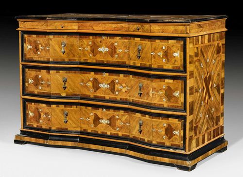 COMMODE,Early Baroque, Lombardy circa 1680/1700. Walnut, burlwood, local fruitwoods and finely engraved ivory with inlays and partly ebonized. Front with 4 drawers, the top drawer narrower. Fine bronze mounts and drop handles. 142x64x98 cm. Provenance: from a German castle collection.