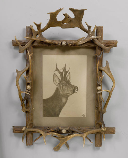 PAIR OF FRAMES WITH ANTLERS,