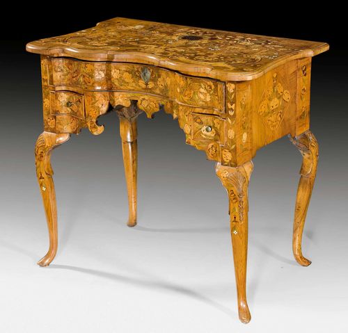 SMALL DESK "A FLEURS",late Baroque, the Netherlands, 19th century. Mahogany, ivory and various precious woods in veneer with exceptionally fine inlays. The front with large central drawer above 1 drawer on each side. Brass mounts and drop handles. 82x50x76 cm.