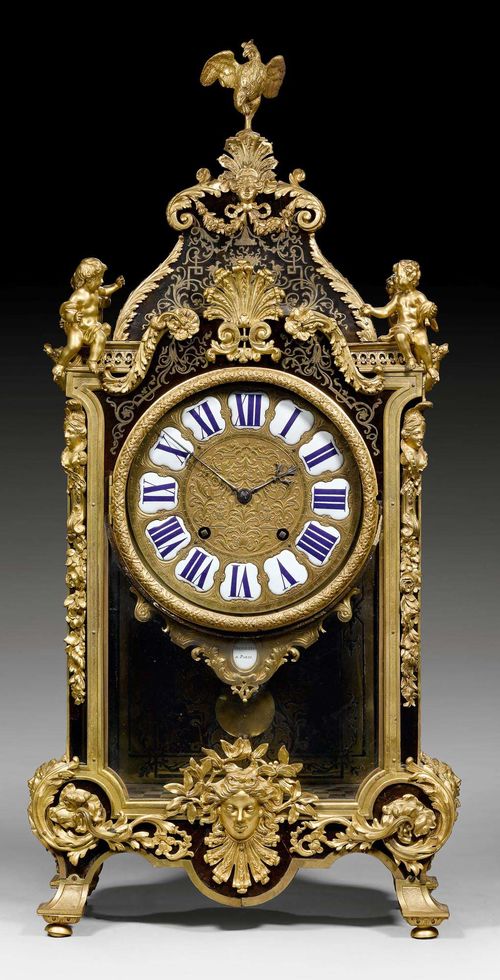 BOULLE CLOCK,Louis XIV, the dial and movement signed THUILLIER A PARIS (Pierre Thuillier, maitre 1722), Paris circa 1720/30. Ebonized wood and dark brown tortoiseshell, with fine, engraved brass inlays in "premiere partie" and "contre partie". Richly relief-decorated dial with 12 enamel cartouches. Anchor escapement with 1/2 hour striking. Richly gilt bronze mounts and applications. 42x21x88 cm.