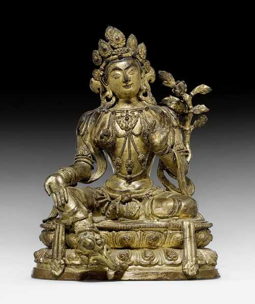 A GOLD LACQUERED WOODEN FIGURE OF THE GREEN TARA.