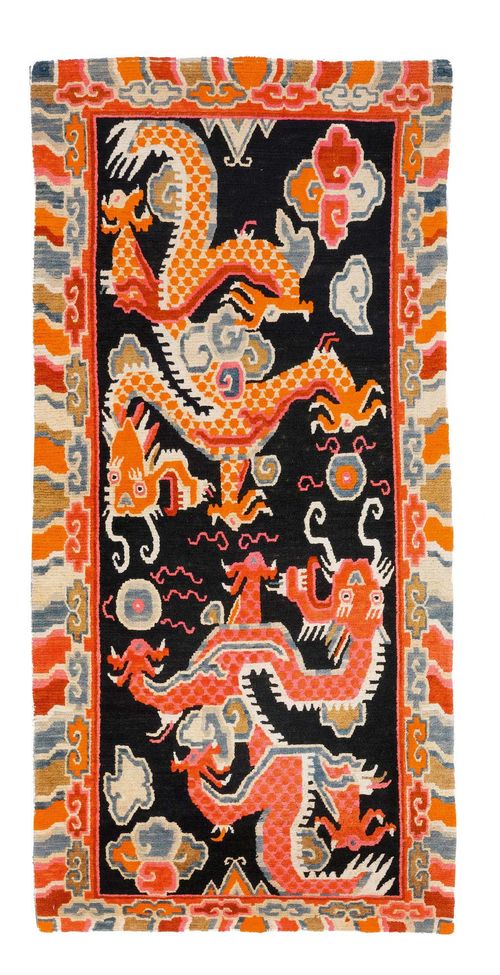 2 MATCHING TIBET antique. Dark blue central field with dragon motifs in pink, colourful border, each 90x160 cm.