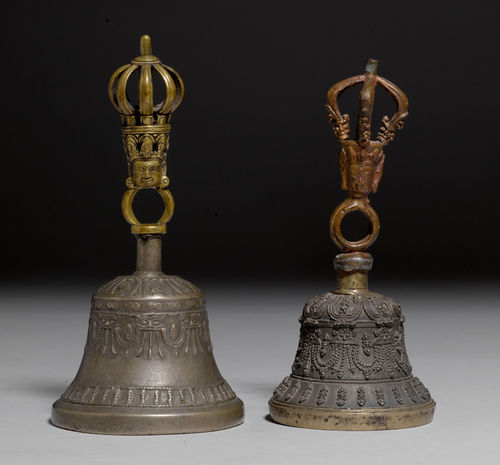 TWO BRONZE AND BELL METAL GHANTAS WITH VAJRA-SHAPED TERMINALS AND BELLS WITH RELIEF DECORATION.