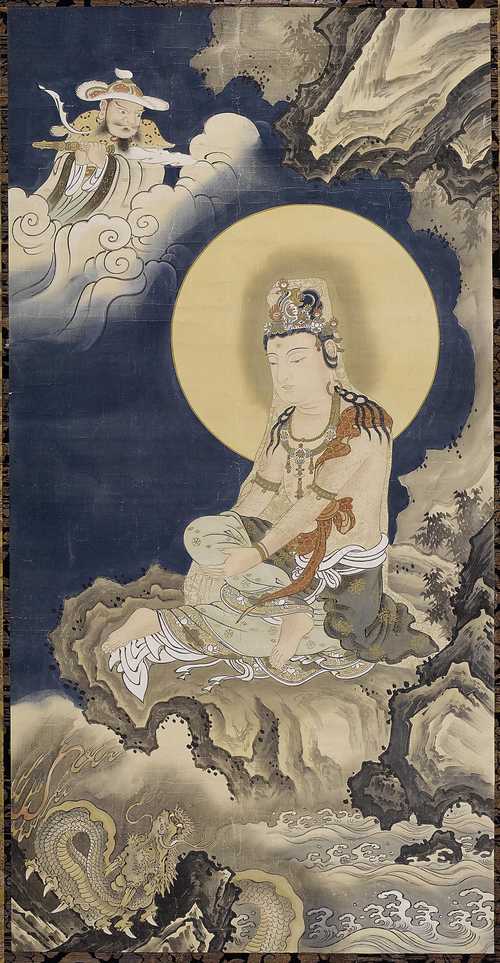 A HANGING SCROLL OF KANNON SEATED ON A ROCK AND ACCOMPANIED BY A DRAGON.