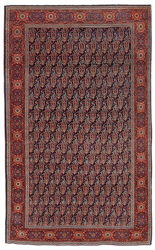 FERAGHAN old.Dark blue central field patterned throughout with boteh motifs in pink and green, rust coloured edging with stylized blossoms, 125x195 cm.
