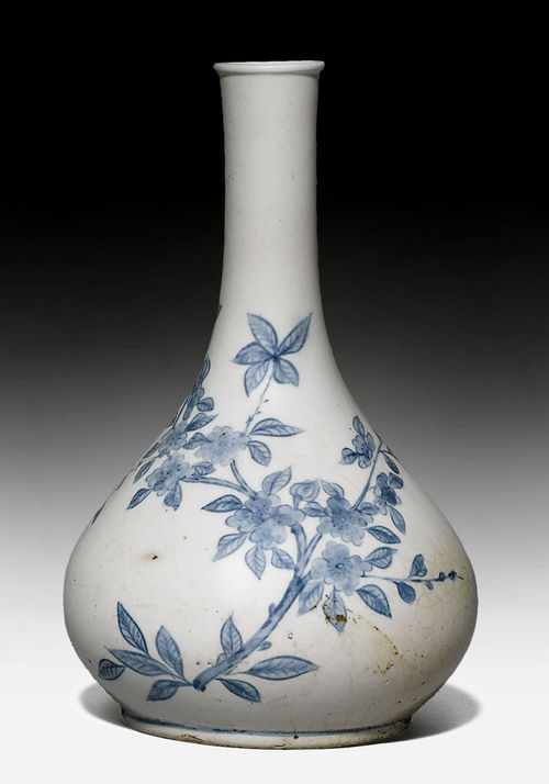 AN UNDERGLAZE BLUE PEAR-SHAPED VASE DECORATED WITH CHERRY BLOSSOMS AND A BUTTERFLY.