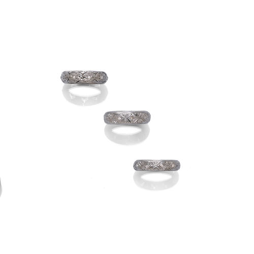 THREE PLATINUM AND DIAMOND RINGS.