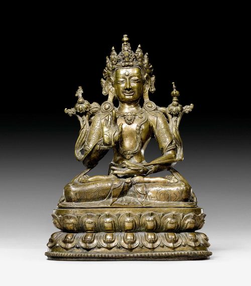 A BRONZE FIGURE OF MAITREYA. Tibet, 16th c. Height 28 cm.  Lotus base cast seperately.