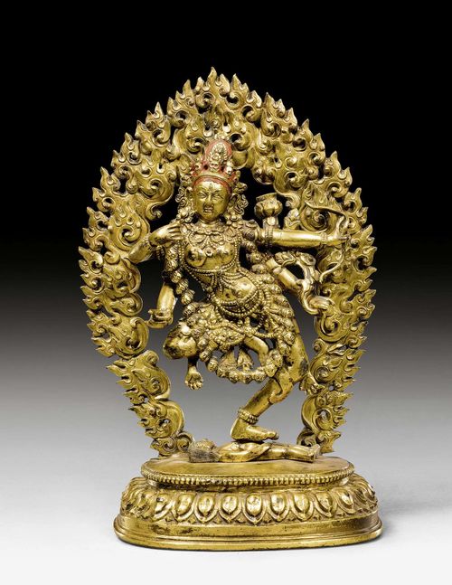 A GILT BRONZE FIGURE OF THE DANCING KURUKULLA. Tibet, ca. 18th c. Height 21.5 cm.