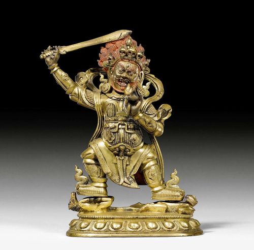 A GILT BRONZE FIGURE OF BEGTSE. Tibeto-chinese, 18th c. Height 19 cm. Consecration plate replaced.