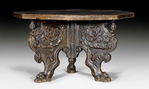 CENTER TABLE "AUX BUSTES DE FEMME",Renaissance, probably Florence circa 1550 and later. Exceptionally richly carved walnut. Octagonal top. W 77 cm. H 75 cm.