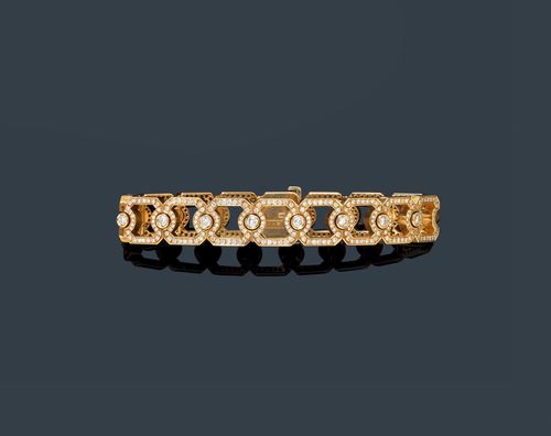 DIAMOND AND GOLD BRACELET, TRUDEL, ca. 1987. Pink and white gold 750, 45g. Decorative bracelet, the octagonal links set throughout with 16 brilliant-cut diamonds weighing ca. 1.19 ct and 448 brilliant-cut diamonds weighing ca. 2.25 ct. L ca. 17.5 cm. With case and copy of the insurance estimate.