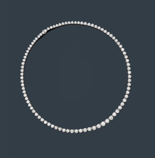 DIAMOND NECKLACE. White gold 750. Classic Rivière necklace of 91 brilliant-cut diamonds weighing 25.00 ct in total, ca. G-H/VS1-VS2, set in chatons, L ca. 42 cm. With IGL Report No. 7519130, October 2012.