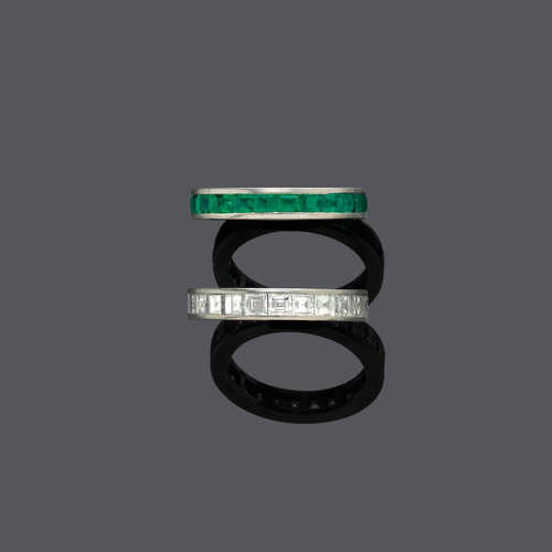 DIAMOND AND EMERALD MEMORY RINGS.