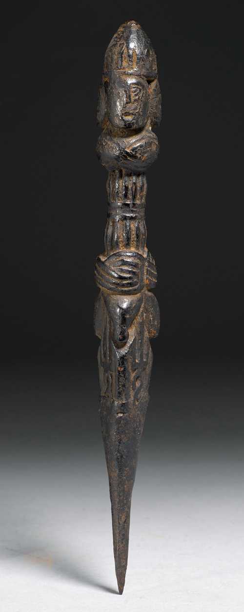 A PURBHU OF BLACK-LACQUERED WOOD AND IRON. Nepal, 18th c. or earlier, L 27.5 cm.