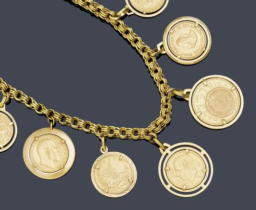 A COIN NECKLACE, circa 1970. Yellow gold 750 chain and settings weighing in total 192g. L ca. 65 cm.