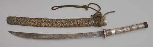 A DHA (SWORD) WITH ENGRAVED SILVER GRIP,THE POMMEL COMPRISING A CHINESE COIN.