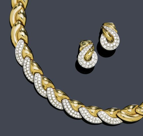 A GOLD AND DIAMOND NECKLACE WITH EAR CLIPS, WEMPE. Yellow and white gold 750. 147g, ear clips 12g. Necklace set with ca. 112 diamonds of a total of ca. 2.30 ct. L ca. 43 cm. Matching ear clips/studs set with diamonds of a total of ca. 1.00 ct.