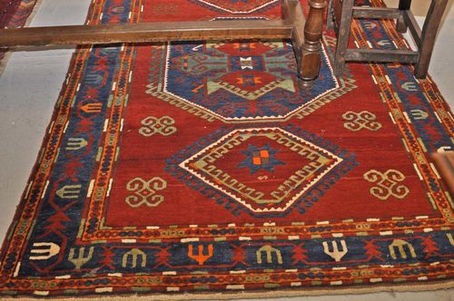 KAZAK old. Red central field with three medallions, geometrically patterned, blue border, good condition, 159x218 cm.